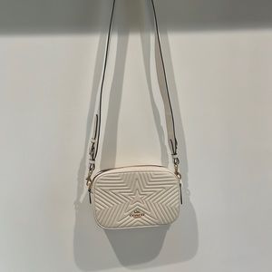 10" x 7" crossbody bag, cream color, camera strap